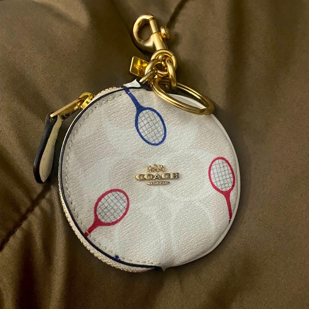 Coach round coin purse   come with signature and has racquet